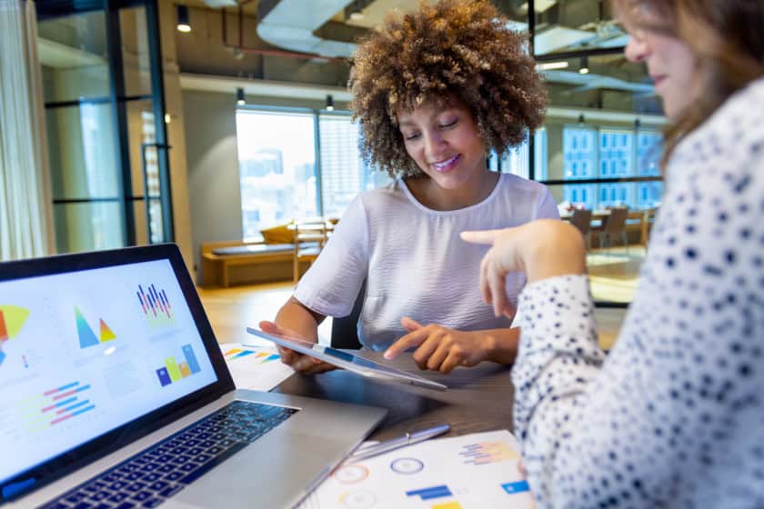 Business women having a conversation in a modern office