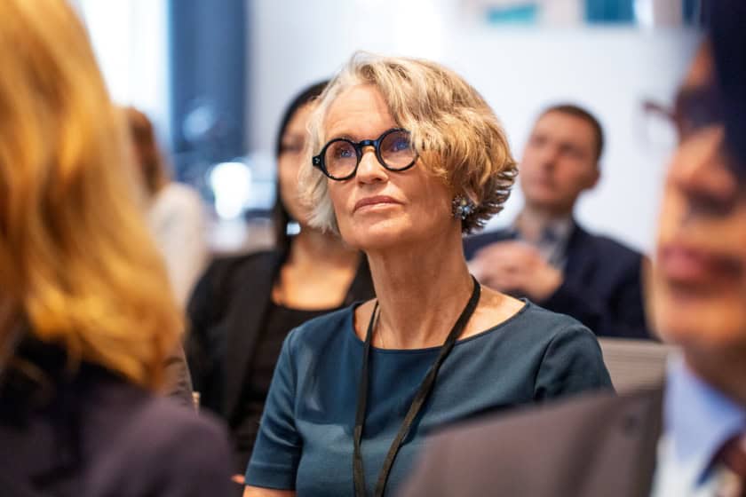 Senior businesswoman attending seminar