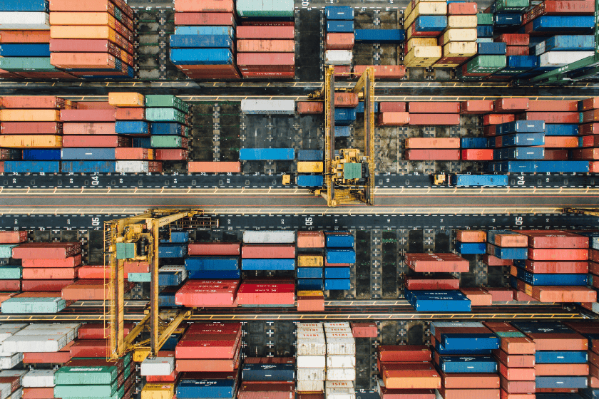 exports-trade-_market-chuttersnap-kyCNGGKCvyw-unsplash Aerial view of a shipping container port