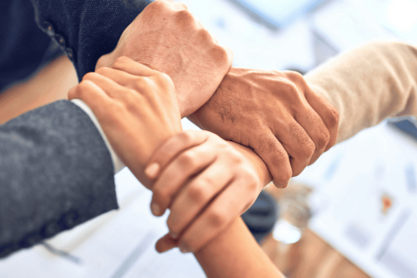 Arms interlocked together