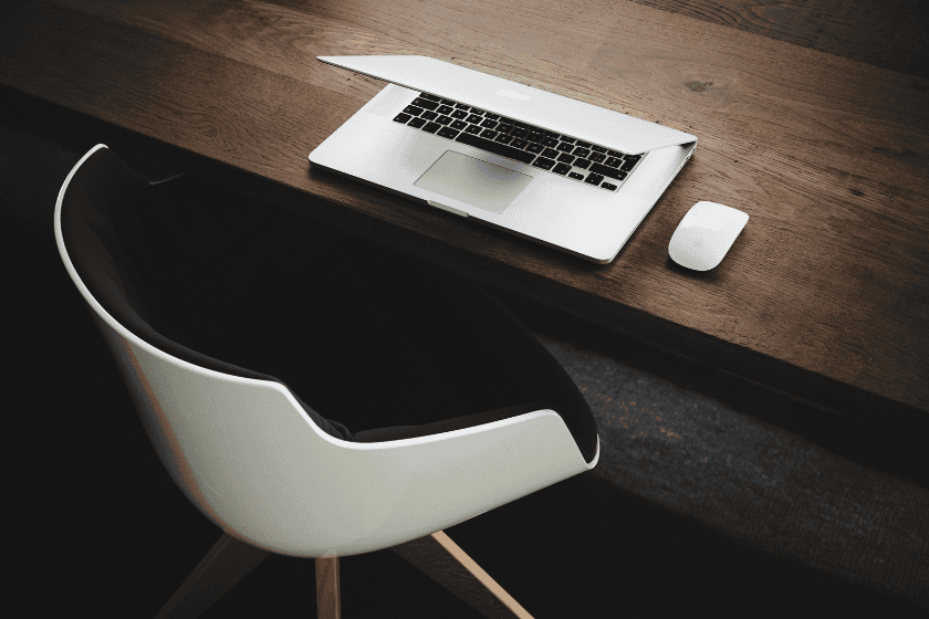 A half-opened laptop on a desk
