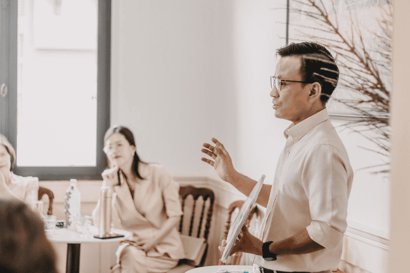 successful-leadership Leader presents to a room with confidence