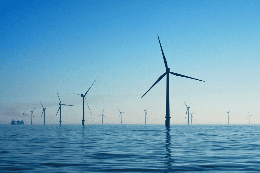 wind-energy-nicholas-doherty-pONBhDyOFoM-unsplash Row of wind turbines in the ocean