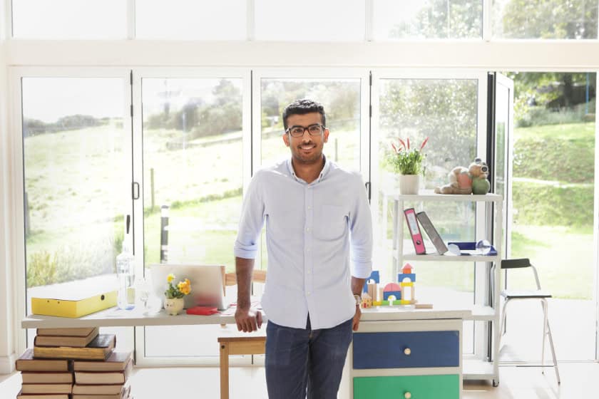 young man smiling at the camera