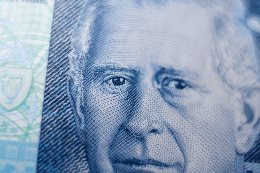 Close up of a five pound note showing King Charles' face